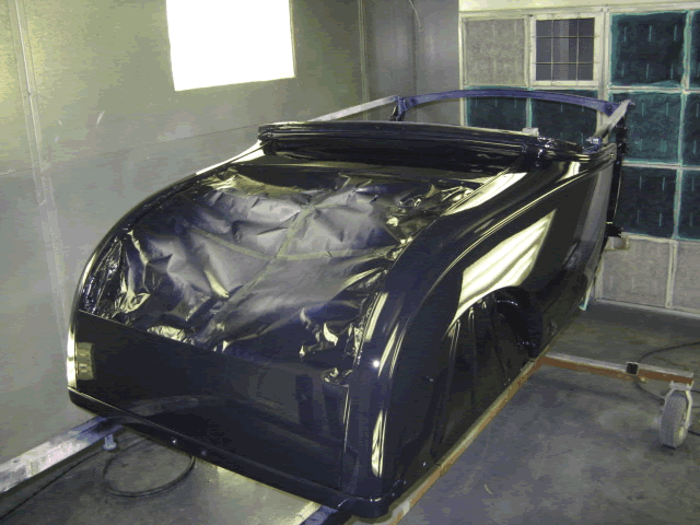 The main paint is applied and awaiting the secondary color (Black) to be applied.